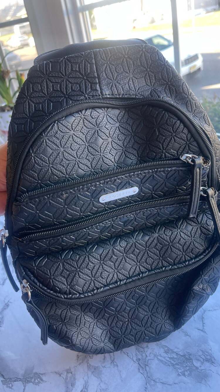 Rosetti Black Faux Leather Geometric Embossed Dome Backpack